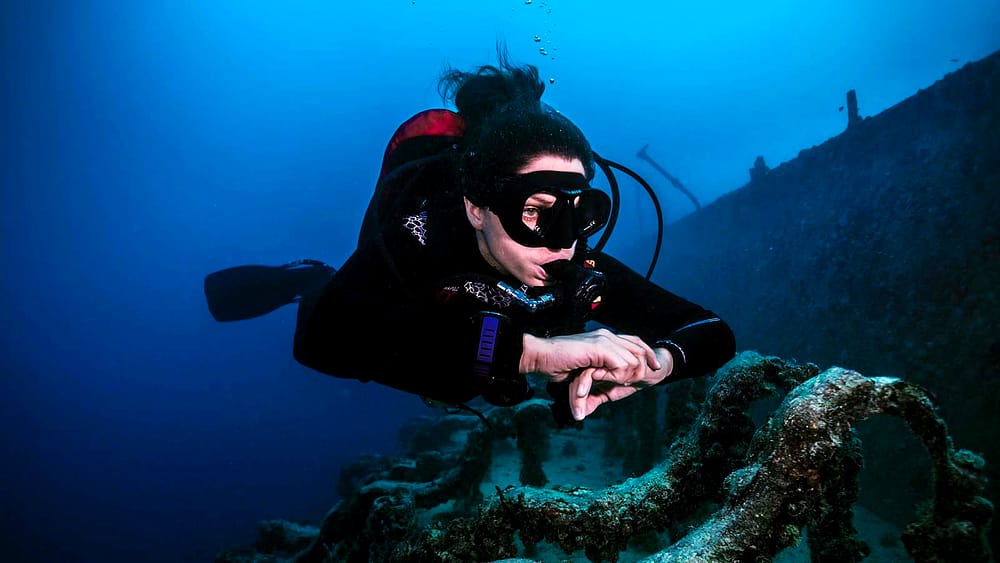 SDI Wreck Diver Exploring Large Wreck SDI Wreck Diver Exploring Large Wreck