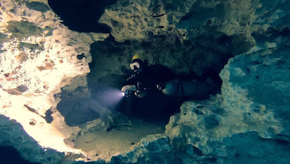 cave diver in sac actun